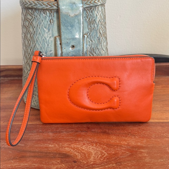 Coach Handbags - COACH Orange Leather Wristlet EUC